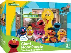 the sesame street giant floor puzzle is in its original box and it's ready to be played