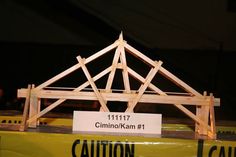 a model of a wooden structure on display