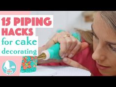 a woman is decorating a cake with icing and sprinkles on it