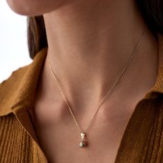 14k Gold Disco Ball NecklaceDetails Available in 14k Gold, 14k Rose Gold, and 14k White Gold Chain: 14k Gold and 18 inches (45 cm) *Model in the photo wears 18 inches (45 cm) chain.GiftingEach design will arrive artfully presented in our branded gift boxes wrapped in a signature ribbon.Production & Delivery Production: 10 - 12 business days Delivery: 1 - 3 business days worldwide via Express Delivery. We’re here to help with style advice, a second opinion, or finding your perfect size. For any q Gold Disco Ball, White Gold Chain, Style Advice, Ball Necklace, Disco Ball, Gift Boxes, Fashion Advice, Gold Chain, Finding Yourself