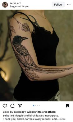 a woman with a bird tattoo on her arm