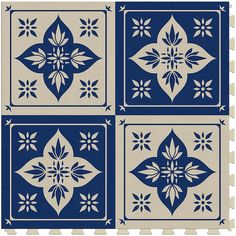 four blue and white tiles with different designs on the sides, all in square shapes