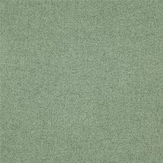 a light green fabric textured with small dots