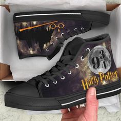 harry potter high top shoes with the hog potter logo on them