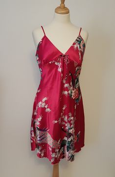 Silky  red satin  Asian  style print  slip dress. Cut on the bias  shaped at the bust ,  adjustable  shoe string straps  , deep V back with ties. This dress slip is non see through  can be worn as a dress or lounge wear . Size     Large   *  a flexible fit   Bust    38"  Hips  44" Length   28"   A very attractive  piece  in very good vintage condition. Care *  Hand Wash  Hang To Dry Short Slip Dress, Satin Clothing, Print Slip Dress, Adjustable Shoes, Dress Slip, Polyester Satin, Red Satin, Asian Style, Dress Red