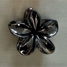 This Is A Shiny Black Plumeria Hair Clip. - Measures: 3" X 2.25" X 1.5" - See Last Pictures For Additional Plumeria Clips - Many Other Hair Clips Available In Boutique Join My Live Shows On Wednesdays And Sundays To See Other Unlisted Headbands And Hair Accessories! From A Smoke-Free, Pet-Free Home. High Road, My Live, Ocean Colors, Flower Clip, Flower Hair Clips, Floral Flower, The High, Floral Flowers, Flowers In Hair