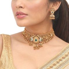 Buy Tarinika Navita Gold-plated Choker Necklace & Jhumka Earring online on Etsy India. Shop for handmade, vintage and unique Jewellery Sets items from Tarinika online on Etsy Indian Gold Necklace, Indian Gold Necklace Designs, Unique Locket, Peacock Motifs, Gold Jewels Design, New Gold Jewellery Designs, Gold Necklace Indian, Rhinestone Choker Necklace, Trending Necklaces