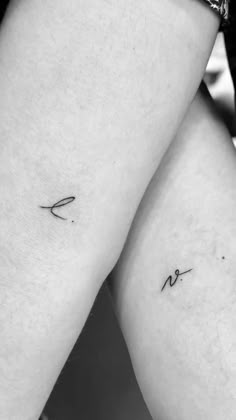 two small tattoos on the legs