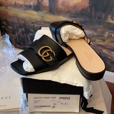 Authentic Gucci Marmont Gg Leather Sandal Brand New Size 36(6) Black Leather Upper Smooth Leather Sole Gold Tone Hardware With Classic Double G Made In Italy Includes Everything Shown Smoke Free Environment Gucci Open Toe Sandals With Buckle Closure, Gucci Open Heel Sandals With Buckle Closure, Gucci Sandals With Buckle Closure And Open Toe, Gucci Open Toe Calf Leather Sandals, Gucci Calf Leather Open Toe Sandals, Luxury Flat Slides With Buckle Closure, Designer Mules With Buckle Closure And Open Heel, Gucci Luxury Sandals With Branded Insole, Elegant Gucci Calf Leather Mules