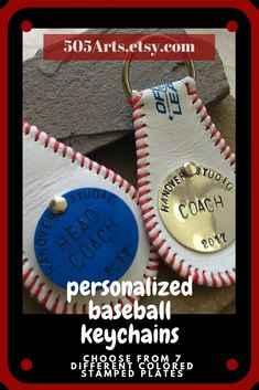 two personalized baseball keychains are on display