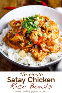 a white plate topped with rice and chicken