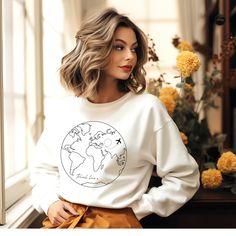 Travel Sweatshirt, Airplane Sweatshirt, Earth Shirt, Travel Gift, Travel Sweater, Adventure Crewneck Sweatshirt, Explore Shirt, Wanderlust ❗️❗️❗️Please be aware that the Sweatshirt is a Unisex Cut and may be oversized. Please check the size charts from the pictures to measure yourself just to be sure you will receive a good sized item. For Woman sizes I suggest to size down. Please note that we are shipping from more Partners when we run out of stock, so you may be receiving orders from another countries, the quality and the prices are there same, unfortunately Etsy doesn't let us to put on the listing more places from wich we send our orders. T-Shirt details: We're gonna make you an offer you can't refuse: the best 100% cotton tee you've ever tried. Pre-shrunk fabric? Check. Side-seamed c Travel Sweatshirt, Travel Sweater, Fitted Sweater, Size Charts, Travel Gifts, True Beauty, That Way, Crewneck Sweatshirt, Sweat Shirt