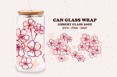 a glass jar with pink flowers on it