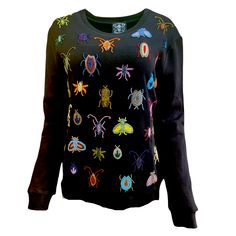 Loved for its painstaking attention to detail, this hand-beaded sweatshirt features a unique array of vibrant insects embroidered into a plain, black sweater for a striking contrast. Rock this unique piece with jeans or leather. Easy to style from day to night. Size Guide XS US 2 UK 4 S US 4 UK 6 M US 6 UK 8 L US 8 UK 10 XL US 10 UK 12 2XL US 10 UK 12 3XL US 12 UK 14 Dm for spec sheet Iron Wolf, Beaded Sweatshirt, Iron Woman, Vibe Check, Spec Sheet, Badass Style, Kate Bosworth, Miranda Lambert, Comfy Cozy