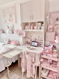 a room filled with lots of pink furniture and decor on top of white walls next to a bed