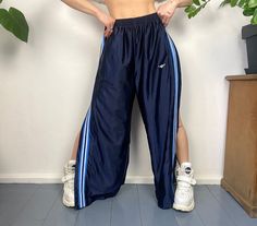 Vintage track pants that can be ripped off from body. tag: Cheetah Made in Taiwan. Pockets: yes! snap button closure on each side. Size: M mens (Model in picture is size eur S) Measurements (when garment laid flat): Length: 109 cm inseam: 75 cm Hips: 65 cm* Waist: 36 cm (elastic)* Condition: good vintage condition . Shipping worldwide! Always with A+ priority and with tracking code. Order handling time 1-3 working days. Shipping via post 1-30 working days. If you have any questions - feel free t 90s Style Stretch Streetwear Pants, Mens Track Pants, 90s Street Style, Track Pants Outfit, Tracksuit Pants, Womens Sports, Sport Pants, Pants Outfit, Sports Women