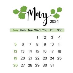 a calendar with the word may in black and green ink on it, sitting next to a