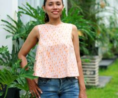 Fitted Sleeveless Printed Blouse, Printed Cotton Sleeveless Blouse, Printed Sleeveless Cotton Blouse, Chic Sleeveless Printed Blouse, Summer Printed Sleeveless Blouse Top, Summer Sleeveless Printed Blouse, Casual Batik Print Blouse, Bohemian Tops With Batik Print For Summer, Bohemian Batik Print Top For Summer