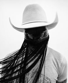 Daniel Pitout, known professionally as Orville Peck, is a South African country musician based in Canada. He wears a fringed mask and has never shown his face publicly. He released his debut album Pony in 2019, followed by the EP Show Pony the next year. His second studio album Bronco was released on April 8, 2022. Cinematic Visuals, Nadine Coyle, Orville Peck, Sarah Harding, Designer Photography, Kimberley Walsh, Nicola Roberts, Country Musicians, Canada Photography