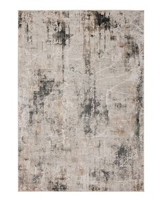 an abstract rug with black and white colors