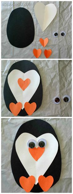 the penguin is made out of paper and has hearts on it