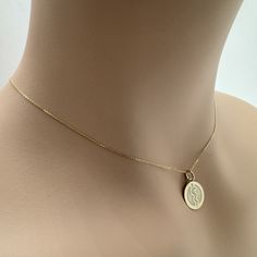 ♥ Necklace Material: Solid gold 14k (REAL GOLD)  ♥ Metal Stamp: 585 (For 14k) ♥ Pendant Thickness: 0,5 mm ♥ In the photos the size of the pendant is 12,7 mm / 0.5 inches Diameter & the Chain Thickness is the No.1: 0,7mm ♥ Pendant Dimensions is available in 3 sizes:  - 12,7 mm / 0.5 inches - 15,3 mm / 0.6 inches - 19,1 mm / 0.75 inches ♥ Dime Dimensions (used in some photos for size comparison): 17.91 mm / 0.70 inches  ♥ Chain Thickness Options: - Chain Thickness No.1 : thickness 0,7mm - Chain Th Rod Of Asclepius, Size Comparison, Disc Necklace, Necklace Dainty, Metal Stamping, Real Gold, No. 2, Custom Jewelry, 6 Inches