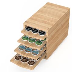 three tiered bamboo spice rack with four different types of spices