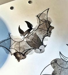 an artistic painting on the ceiling of a building with birds and bats flying over it