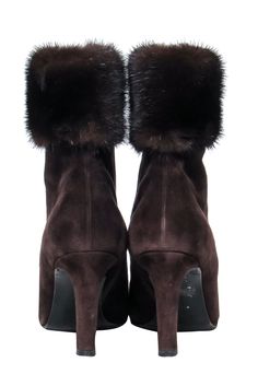 Go for a fall striking look with these fur trimmed booties by Yves Saint Laurent! Made in a soft suede and rich brown hue, these short boots take it up a notch with a fur mink ankle trim! The short heel is the perfect length for bootcut jeans and a matching suede moto jacket! Size 7.5 Made in Italy Leather upper Mink ankle trim Inner ankle zipper Heel height 3.5" Toe to heel 10" Shaft 7" Circumference 10" Fall Shoes Aesthetic, Boots With Fur, Luxury Brown Winter Heeled Boots, Luxury Suede Ankle Heeled Boots, Fur Trim Boots, Fur Boots Heels, Fur Trim Ankle Boots, Saint Laurent Fur Heels, Diesel Bag