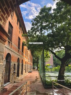 an old brick building with stairs leading up to it and the words post rain scenes