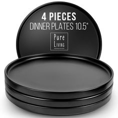 four pieces of black dinner plates sitting on top of each other