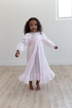 Any little girl that loves the Nutcracker will adore this Clara-inspired peignoir set. This sophisticated and comfortable peignoir set brings a classic touch to a younger generation. Femininity has never been this comfortable! The floor-length nylon robe and nightgown are decorated with lace trim. Cinched for a smart look yet able to be kept loose and flowing for maximum comfort. A classic style for a little girl. The Clara Nightgown is also available in Blue, Lavender and Pink. Size ChartLoving Nightgown Pattern, Girls Nightgown, Heirloom Dresses, Girls Nightwear, Night Gowns, Peignoir Sets, Cotton Nightgown, Classic Girl, Elegant Girl