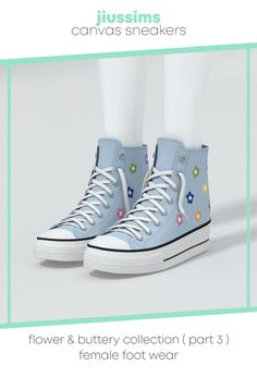 a pair of blue sneakers with multicolored buttons on the side and white legs