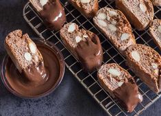 several pieces of bread on a cooling rack with chocolate