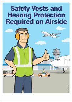 safety vests and wearing protection required on an airport worker with headphones giving thumbs up