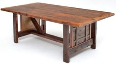 an old wooden table is shown against a white background with no one around it to see