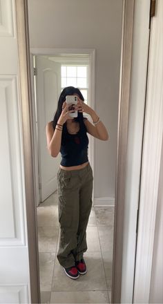 Baggy Cargo Pants Outfit Aesthetic, Grey Top Green Pants Outfit, Olive Green And Black Outfits For Women, Black Top Olive Pants Outfit, Tank Top Cargo Pants Outfit, Cargo And Tank Top Outfit, Tank And Cargo Pants, Green Cargo Pants With Black Top, Green Cargo And Black Top