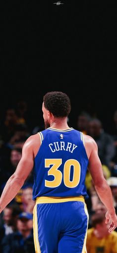 a basketball player with the number 30 on his jersey