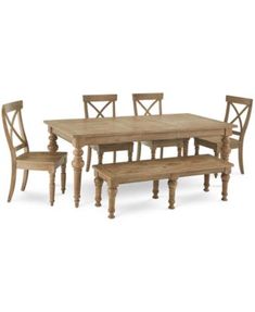 a wooden table and four chairs sitting next to each other on a white background,