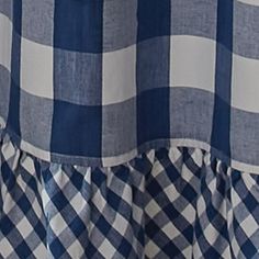 a blue and white checkered dress with ruffles