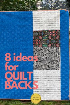 the book 8 ideas for quilt back's is on display in front of some trees