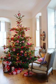 a decorated christmas tree in a living room