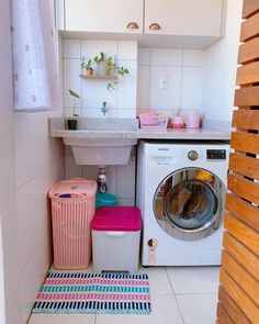 a washer and dryer in a small room