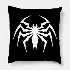 a black and white spider - man logo pillow