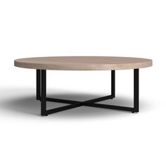 an oval table with black metal legs and a wooden top, against a white background