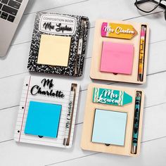 three notebooks with different colored sticky notes on them next to a laptop and eyeglasses