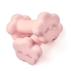 two pink toy shaped like clouds on a white background