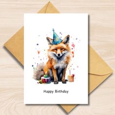 a birthday card with an image of a fox wearing a party hat and candles on it