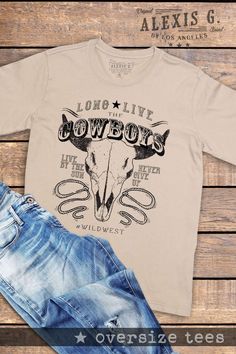 LONG LIVE THE COWBOYS GRAPHIC OVERSIZE TEES Our Shirts are Authentically Designed and Hand Screen Printed for Best Quality *Process where the ink is dyed into the shirt and graphic will not peel away -Proudly Hand Pressed in Los Angeles, CA. -30 Singles. 100% Washed Cotton -Comfortable and Very Soft -Style by Rolling up the Sleeves, Tie a Side Knot, Front Tuck... SIZE AND FIT *Please refer to the last photo option for measurements WASHING AND CARE -Machine Wash with Like Colors -Tumble Dry Low - Bulls Skull, Cowgirl T Shirt, Screen Print Shirt, Vintage Western Shirt, Mama Cloth, Western Vibes, Oversize Tee, Front Tuck, Cowboy Shirt