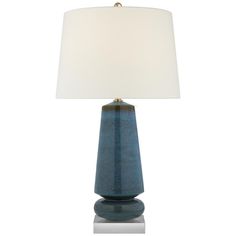 a blue table lamp with a white shade